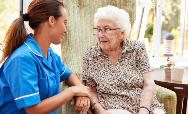 Senior Woman with Nurse