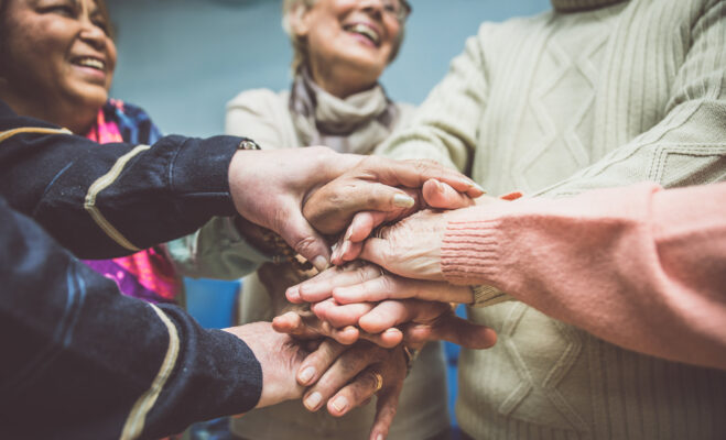 Seniors Holding Hands