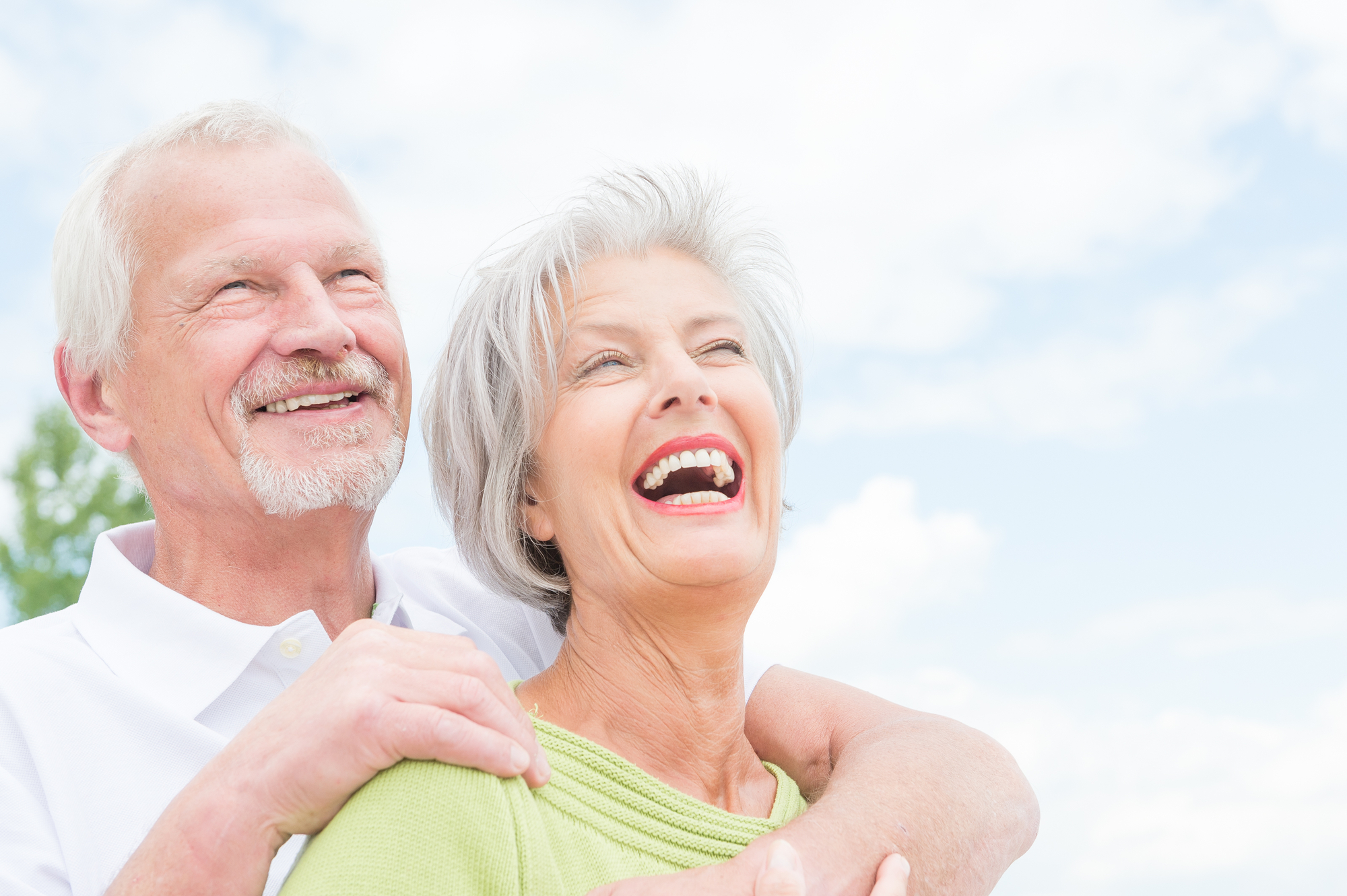 Happy senior couple. Laughter is helpful for promoting feelings of positivity.