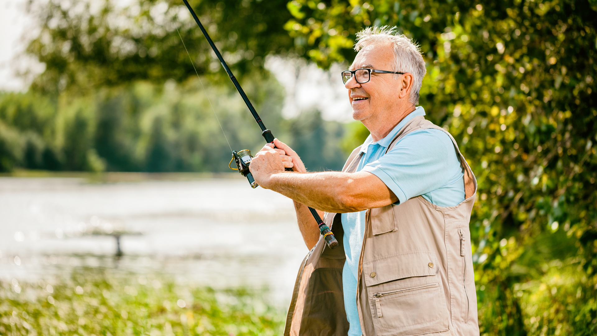 senior man fishing in the summer